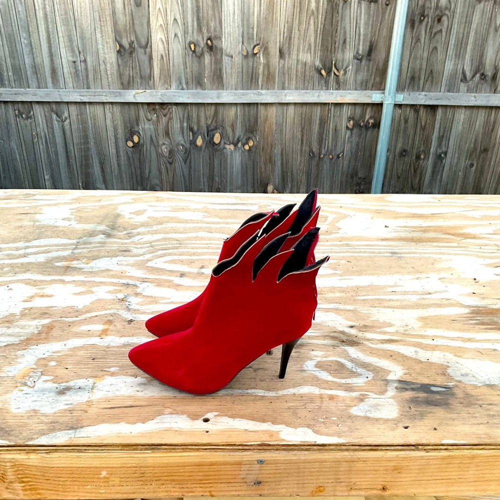 Carol shoes flame shape ankle boots. Size 9.5
